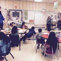 Erin Cartwright Weinstein - Reading to  WJ Murphy standing